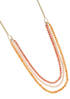 Fossil Drama Triple Strand Pendant Necklace in Shades of Peach
