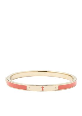Fossil Thin Shiny Goldtone Polished Steel and Coral Epoxy Keyhole Hinged Bangle