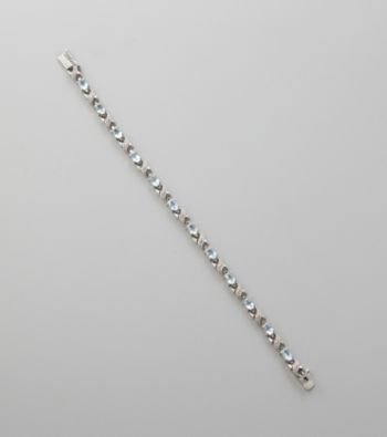 Designs by FMC Sterling Silver Plated Blue Topaz and Diamond Accent Boxed Bracelet