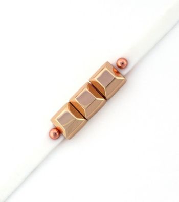 BCBGeneration™ White and Rose Goldtone Mini Charm Rubber Bracelet