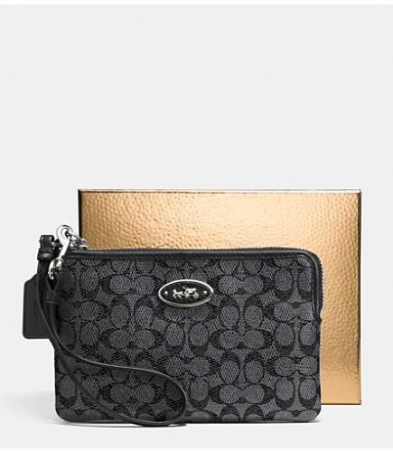 COACH SMALL L-ZIP WRISTLET IN SIGNATURE COATED CANVAS