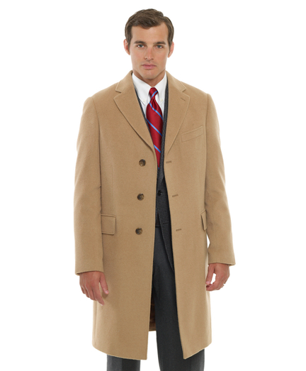 Single-breasted Regent coat. Made with pure camel hair from Loro Piana�. 39" center back length. Fully lined. Dry clean. Imported.