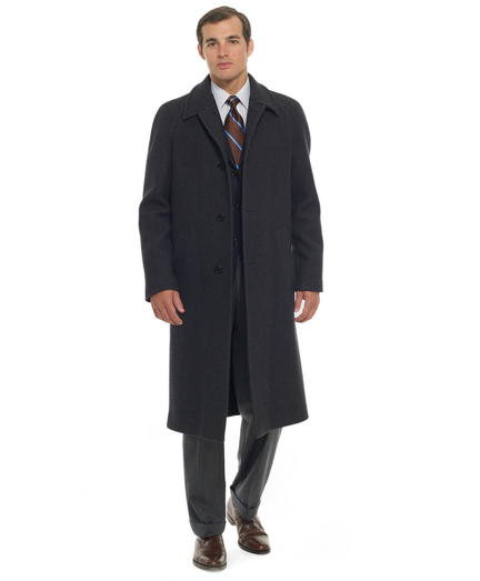 Diagonal twill overcoat made from pure wool woven in Italy. Split raglan sleeves for added comfort.45" center back length. Dry clean. Imported.