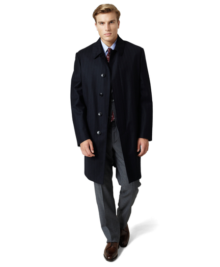 A great transition coat in a wool and cashmere blend woven in Italy. Fully lined. Water resistant with Storm System by Loro Piana. 38" center back length. Dry clean. Imported.