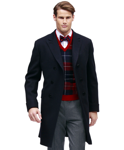Luxurious wool woven in Italy. Double-breasted. 38" center back. Fully lined.  Dry clean. Imported.