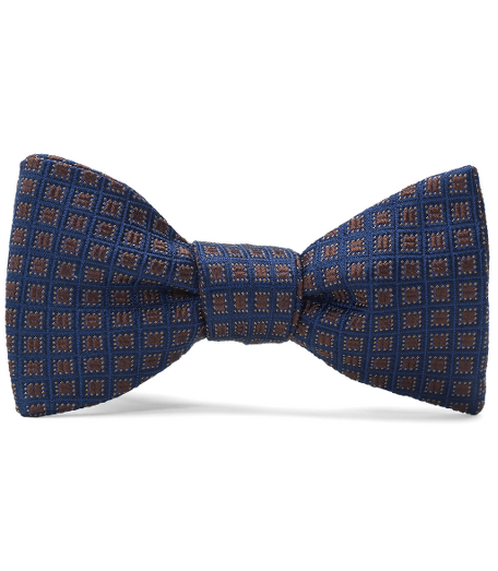 Pure silk woven in Italy. Self-tie bow. Dry clean. Made in the USA.