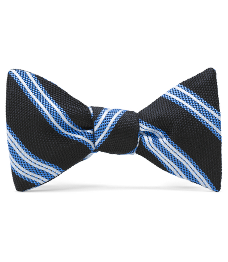 Pure silk woven in England. Fabric is treated to repel liquids and stains. Self-tie bow. Dry clean.Made in the USA.
