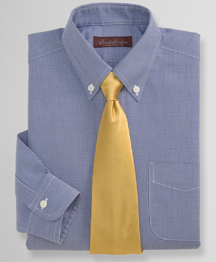 Pure cotton treated to resist wrinkles. Pucker-free seams look freshly pressed all day. Single-needle tailoring. Durable cross-stitched buttons. Pinpoint cotton with button-down collar and barrel cuffs. Machine wash. Imported.