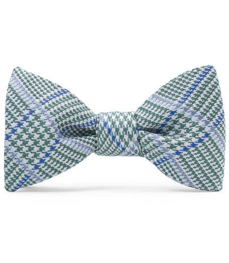 Pure silk woven in England. Self tie. Dry clean. Made in the USA.