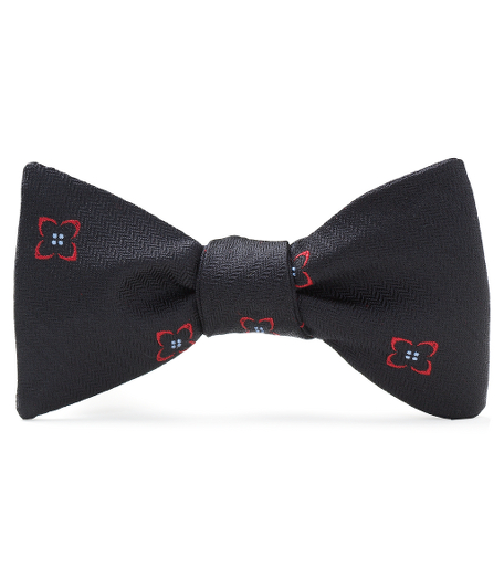 Pure silk woven in England. Self tie. Dry clean. Made in the USA.