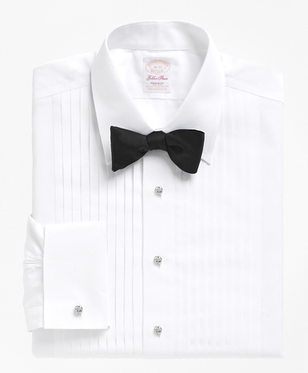 10-pleat bib front with tennis collar. French cuffs and mother-of-pearl buttons. Treated to remain virtually wrinkle-free. Imported. Cuff links not included.
