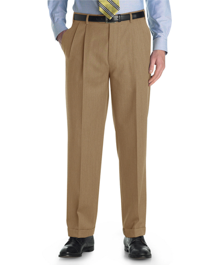Tailored in pure worsted wool. On-seam pockets. Lined to the knee. Unfinished hem. Dry clean. Imported.