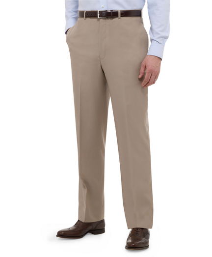 Tailored in pure worsted wool. On-seam pockets. Lined to the knee. Unfinished hem. Dry clean. Imported.