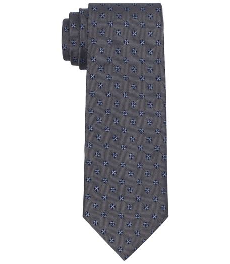 Pure silk woven in England. 3 1/2" width. Dry clean. Made in the USA.