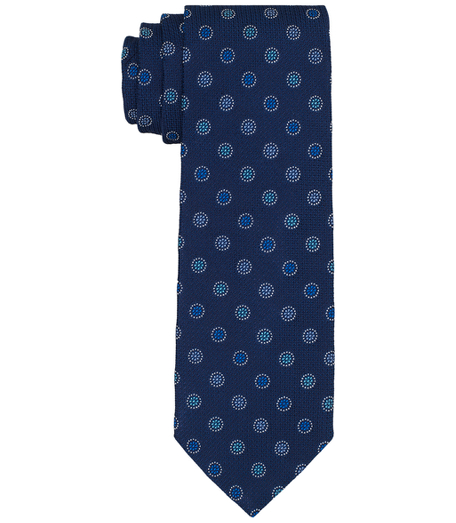 Pure silk woven in England. 3 1/2" width. Dry clean. Made in the USA.