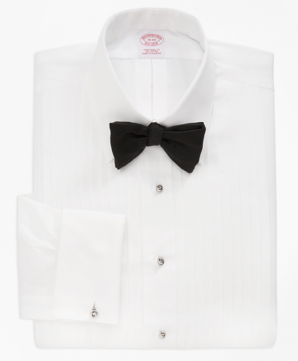 Tailored in pure 100s 2-ply cotton broadcloth with French cuffs and a removable mother-of-pearl button strip. Machine wash. Imported. Cuff links not included. Also available in Slim fit.