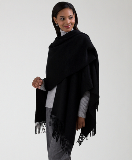 Cashmere. Pure cashmere with a 3" fringe. Falls 28" from shoulder. Dry clean. Imported.