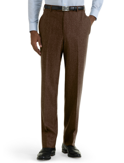 Italian wool flannel. Regent fit. Lined to knee. Taped seams and unfinished hems. Dry clean. Imported.