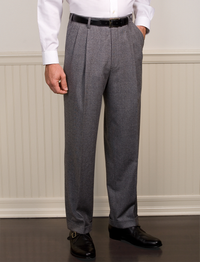 Pure Italian wool flannel. Genuine corozo buttons. Lined to the knee. Taped seams and unfinished hem. Dry clean. Imported.