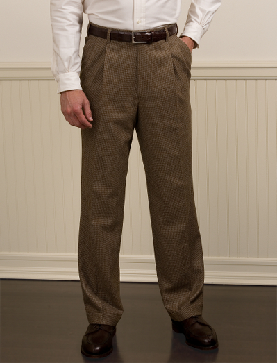 Pure Italian wool flannel. Genuine corozo buttons. Lined to the knee. Taped seams and unfinished hem. Dry clean. Imported.