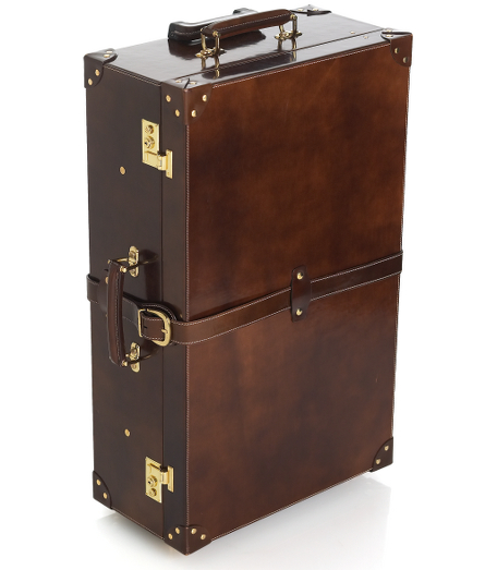 Genuine Spazzolato leather is polished to a high shine. Hard cases are fully lined. Interior pockets. 27 1/2" x 8 1/2" x 18 1/2".  Brass hardware. Made in Italy.