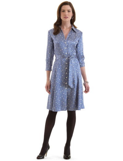Silk charmeuse. Fully lined. Button front closure. Self-fabric belt at waist. Three-quarter sleeves with french cuffs. 40". Dry clean. Imported.
