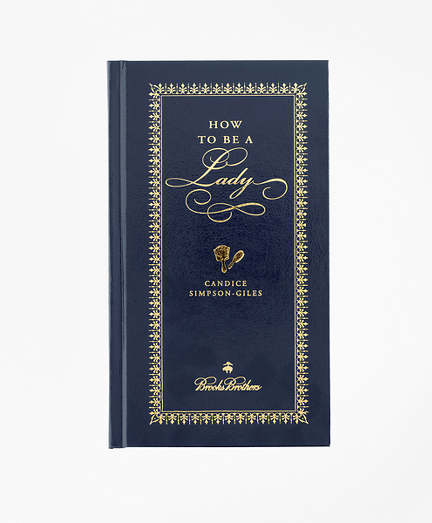 A collection of indispensable books personalized exclusively to Brooks Brothers, featuring sound advice about the manner in which a lady conducts herself in all walks of life. Hardcover and beautifully bound in navy leather with gold-tone edged leaves. Embossed with Brooks Brothers script. Written by Candice Simpson-Giles. Published by Rutledge Hill Press, Nashville, Tennessee.