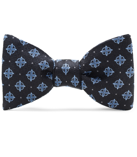 Pure silk woven in England. Self tie. Dry clean. Made in the USA.