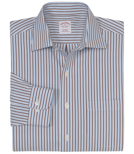 Pure cotton. Made with pucker-free seams and treated to remain virtually wrinkle-free. English collar. Superdurable logo buttons. Center back pleat and signature shirring at barrel cuffs. Left chest pocket. Machine wash. Imported. Also available in Slim fit.