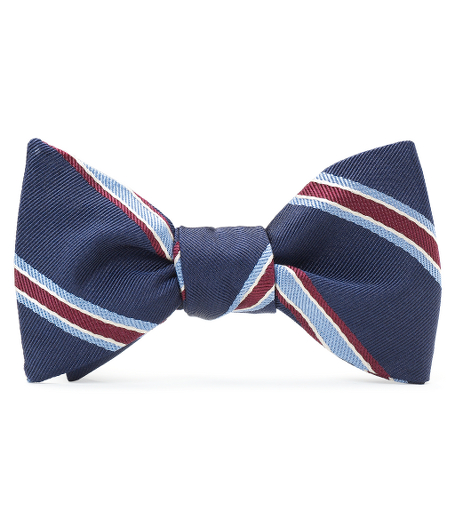 Cotton and silk woven in Italy.  Self tie. Dry clean. Made in the USA.