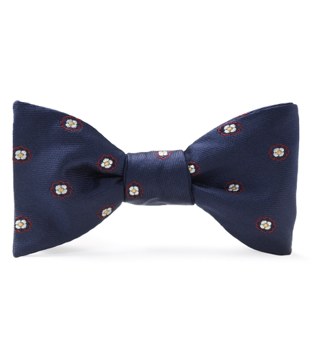Pure silk woven in Italy. Self tie. Dry clean. Made in the USA.