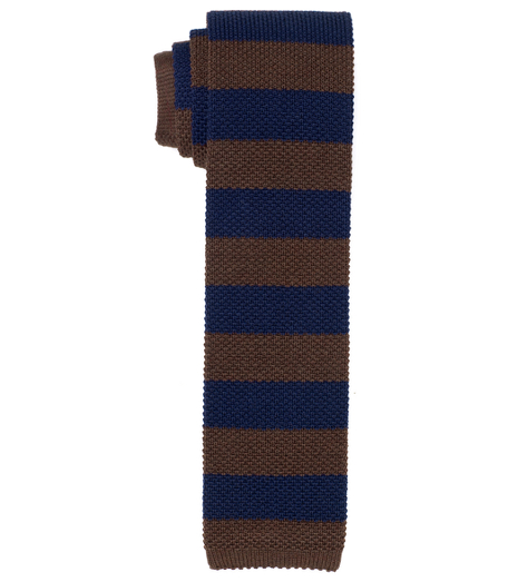 Pure wool woven in Italy. 2 7/8" width. Dry clean. Made in the USA.
