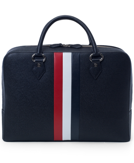 Genuine pebble leather bag has red, white and navy stripes. 10" x 13" x 4.5". Imported.