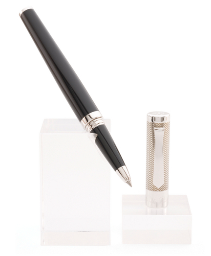 Elegant pen features a cap with an engraved herringbone pattern. Fine-tip roller ball with black ink. Imported from Italy.