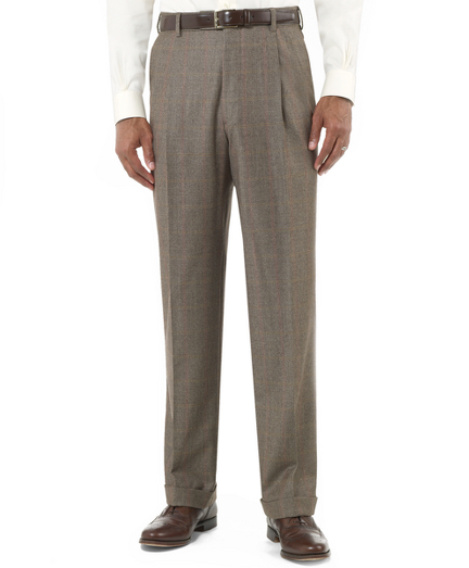 Pure wool woven in Italy. Double-revese pleat, lined to the knee. Unfinished hem. Tailored in our classic, relaxed Madison fit. Dry clean. Made in Canada.
