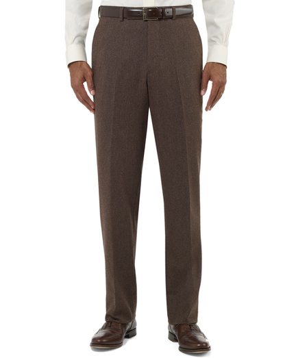 Classic pattern in pure wool woven in Italy. Plain front, lined to the knee. Tailored in our slimmer Regent fit. Unfinished hem. Dry clean. Imported.