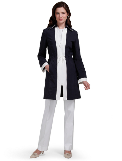 Polyester/nylon. Fully functional hidden drawstring at waist. Center front exposed 2-way zipper. Half lined in Bemberg. Front slant pockets. Water repellant. 35" length. Dry clean. Imported.