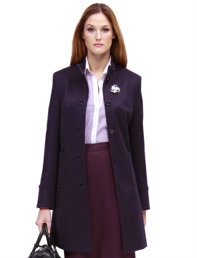 Wool/alpaca. Horn buttons. Fully ined with Bemberg.  Front patch pockets. Top stitch detailing.  Mockneck collar with button closure extension.  34" center back length. Fabric woven in Italy. Dry clean.  Imported.