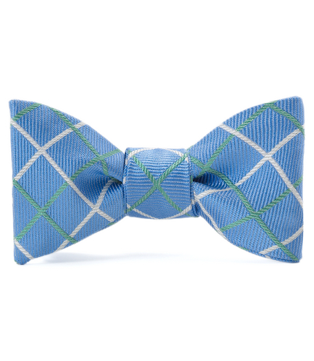 Pure silk woven in England. Self-tie. Dry clean. Made in the USA.