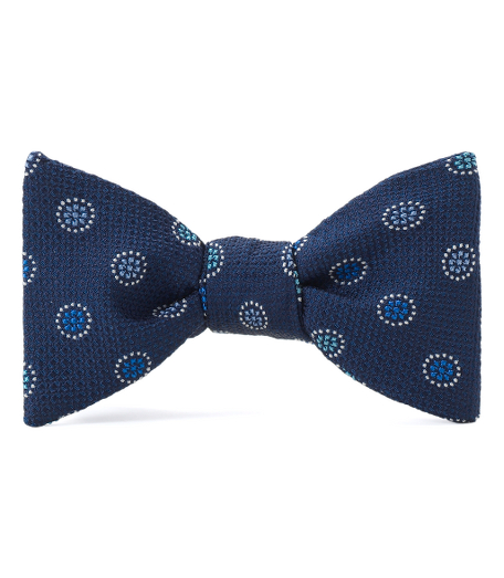 Pure silk woven in England. Self-tie. Dry clean. Made in the USA.