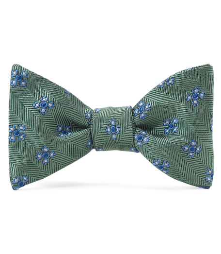 Pure silk woven in England. Self-tie. Dry clean. Made in the USA.
