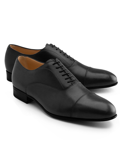 Updated footwear with lightweight and flexible leather soles. Calfskin uppers and leather linings. Made in Italy.