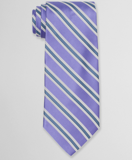 Pure silk woven in Italy. 4" width. Self-loop and tip. Dry clean. Made in the USA.