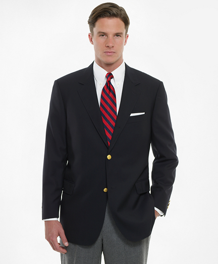 Updated design tailored in premium natural stretch wool by Loro Piana�. 3-button sack. Undarted and fuller through the chest. Narrower shoulders and lapels. Superfine and lightweight. Double besom flap patch pockets. Back center vent. Dry clean. Made in the USA.