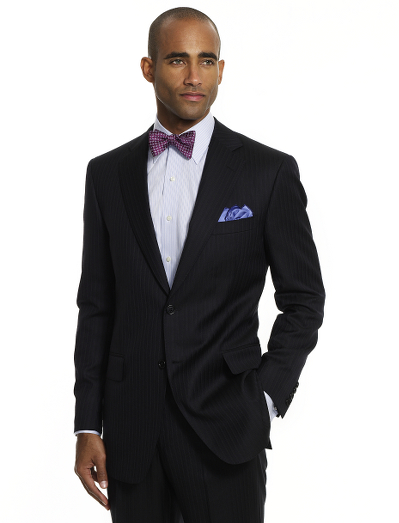 A contemporary take on the classic Brooks Brothers suit. Tailored from elegant wool woven in Italy. Updated with slimmer lines, a narrower lapel with pickstitch detail and trimmer trousers. Fully lined. 2-button jacket with side vent. Plain-front trousers. Dry clean. Made in Italy.