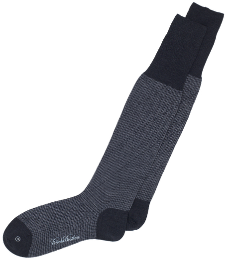 Wool and nylon blend. Handlinked toes. Hand wash, line dry. Imported.