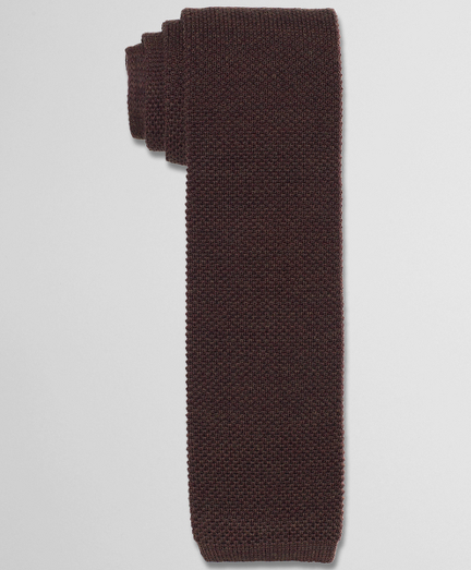 Pure wool woven in Italy. 2 7/8" width. Dry clean. Made in the USA.