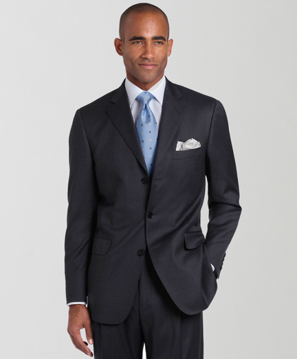 A contemporary take on the classic Brooks Brothers suit. Tailored from elegant Loro Piana� wool woven in Italy. Updated with slimmer lines, a narrower lapel with pickstitch detail and trimmer trousers. Fully lined. 3-button jacket with center vent. Pleat-front trousers. Made in Italy. Dry clean.