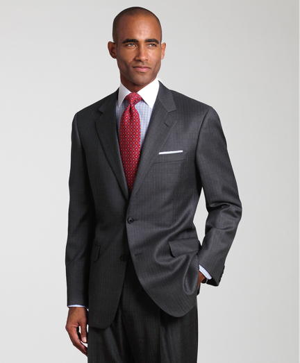 A contemporary take on the classic Brooks Brothers suit. Tailored from elegant Loro Piana� wool woven in Italy. Updated with slimmer lines, a narrower lapel with pickstitch detail and trimmer trousers. Fully lined. 2-button jacket with center vent. Plain-front trousers. Made in Italy. Dry clean.