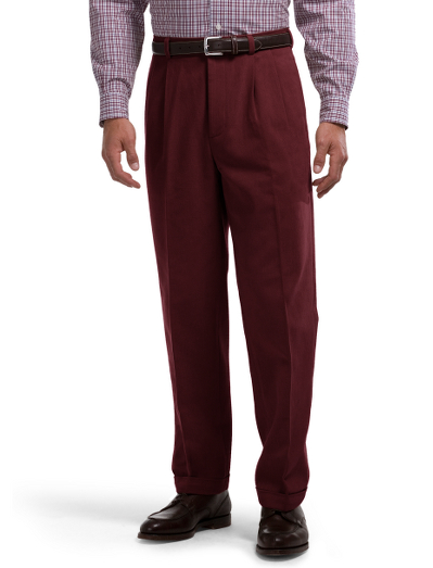 Tailored in soft Italian cotton twill. Relaxed fit, pleat front. Herringbone pocketing. Alterable waistband. Finished hems, cuffed bottoms. Signature logo buttons and ribbon at inside waist. Dry clean. Imported.
